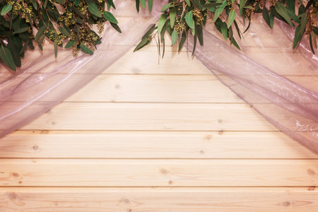 Leaves and cloth on a wood background. Wedding decoration.の写真素材