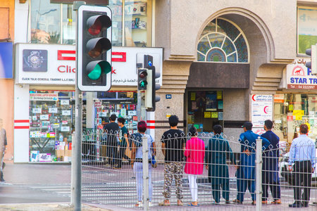 Dubai, UAE February 19, 2018: people are waiting at the traffic lights
