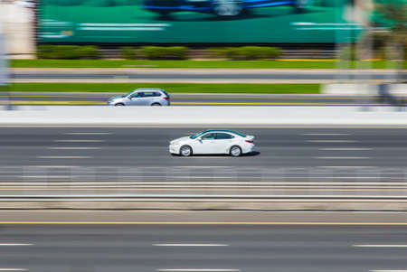 Dubai, UAE February 14, 2018: cars on the high-speed city highway in motionのeditorial素材