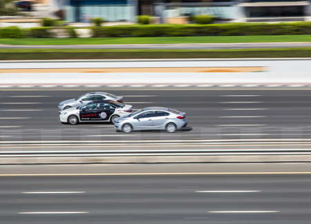 Dubai, UAE February 14, 2018: cars on the high-speed city highway in motionのeditorial素材