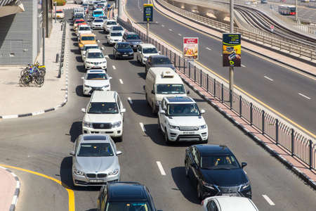 Dubai, UAE February 14, 2018: cars in a traffic jam on a city streetのeditorial素材