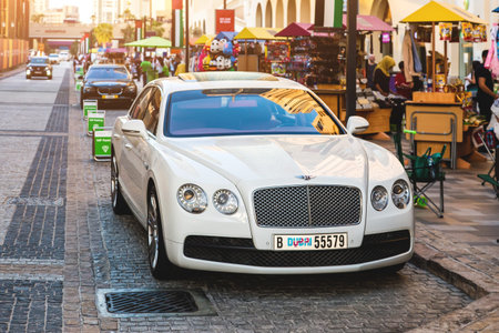 Dubai, UAE February 14, 2018: White Bentley in the parking lotのeditorial素材
