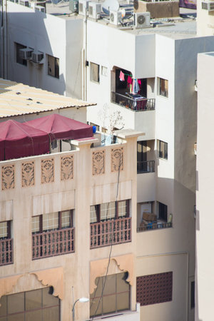traditional Arab architecture. Houses and buildings in old areas of Dubai from light stone and concreteの写真素材
