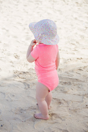 Little beautiful girl baby in panama on the beachの写真素材