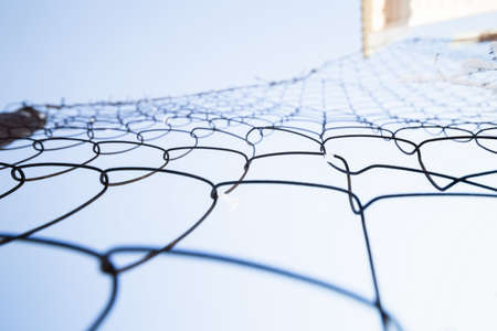 metal grid close-up against blue sky. Rabitzの写真素材