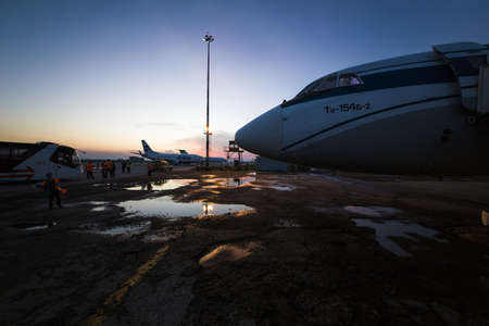 Ufa, Russia. May 19, 2018: A close-up of the Soviet passenger plane Tu-154 against the background of the darkening sky in the parking lot at the airportのeditorial素材
