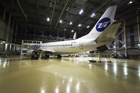 Ufa, Russia. May 19, 2018: Passenger airplane Utair airline on maintenance of engine and fuselage...