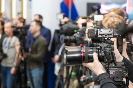 Ufa, Russia 24 May 2018: Business Forum - Oil and Technology. Cameras of journalists and photographers at the press conferenceのeditorial素材