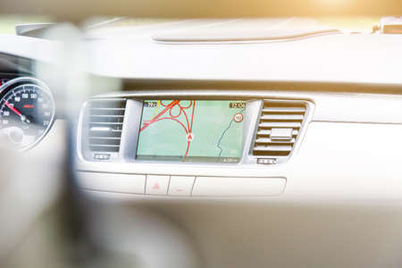 Man hand touching to screen multimedia system with application navigationの写真素材