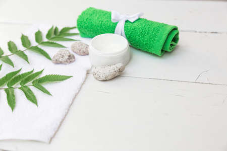 Spa beauty cosmetics on white marble table from above . Copy spaceの写真素材