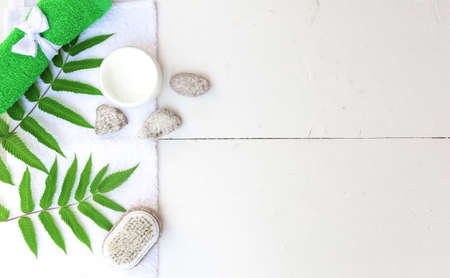 Spa beauty cosmetics on white marble table from above . Copy spaceの写真素材