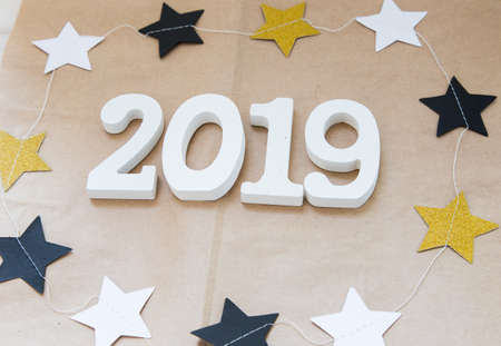 New Years and Christmas layout 2019. festive decorations, cones, garlands, gifts, figures 2019, xmas flatlayの写真素材