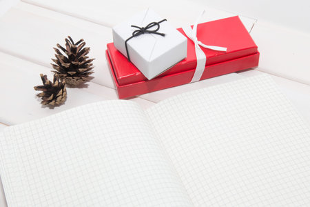 New Years and Christmas layout. decorations, cones, garlands, succulent, gifts, figures 2019, xmas flatlay. Mockup notebook , write goals, plans for the new year in the calendar, diary, plannerの写真素材