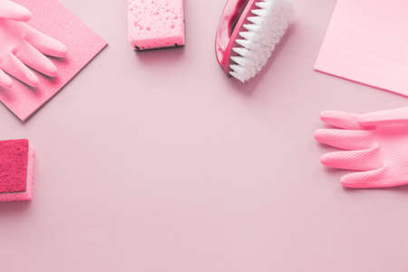 Flat lay Detergents and cleaning accessories in pink color. Cleaning service concept. Flatlay, Top view.の写真素材