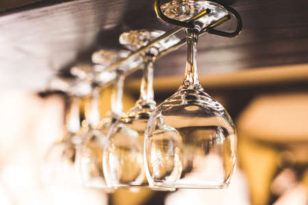 close up of many wine glasses and stemwareの写真素材