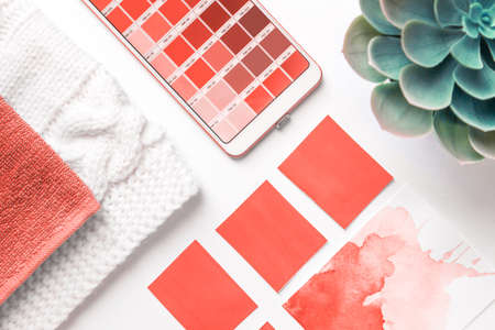 Color Palette Guide in mobile phone on White Background. flatlay. Color of the year 2019 Living coral. livingcoral