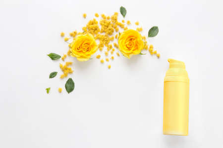 moisturizer for face and flowers. creative composition in the style of minimalismの写真素材