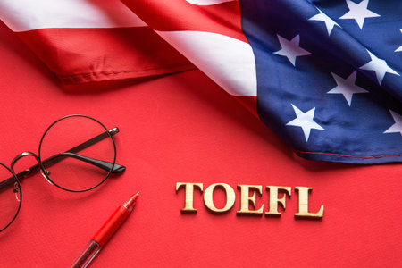 Test of English multiple choice on table. Top view, flatlay, American flag.