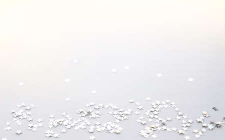 White minimal background. Silver stars top view, flatlayの写真素材