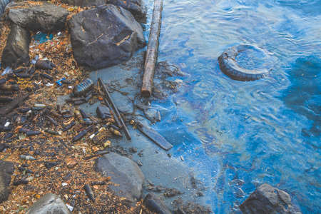 trash plastic bottles on the beach. oil and water pollution of the oceanの写真素材
