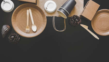 Eco friendly disposable dishes made paper on blackの写真素材