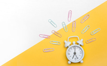 Alarm clock on yellow trending