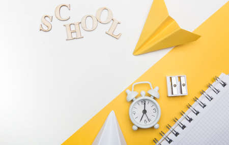 Colorful stationary school supplies on yellow trendingの写真素材