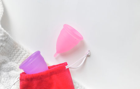 Two silicone menstrual cups.