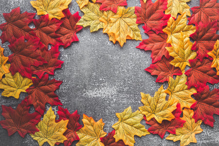 autumn leaves on a gray background. flatlay composition, copyspace for textの写真素材
