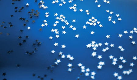 Blue color festive shiny stars.