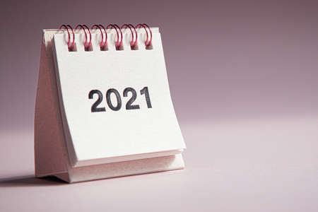 Happy new year 2021. Close up calendar on a pink desktop.の写真素材