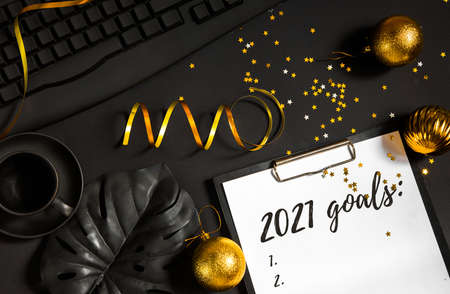Black office desk, new year and christmas eve. Plans and goals for the next year 2021, flat layの写真素材