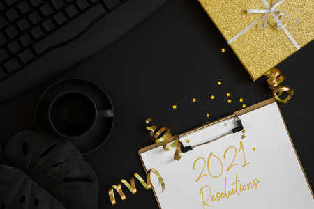 Black office desk, new year and christmas eve. Plans and goals for the next year 2021, flat layの写真素材