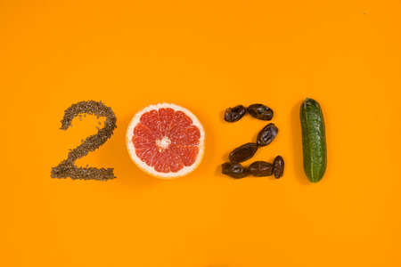 numbers 2021 made from fruits and vegetables, Healthy happy New year, diet goals and lifestyle.の写真素材