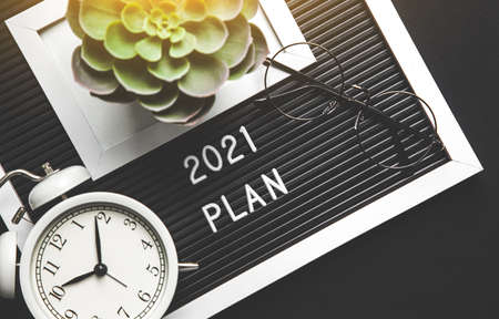 2021 new year goal, plan, action. office accessories. Business motivation, inspiration concepts ideasの写真素材