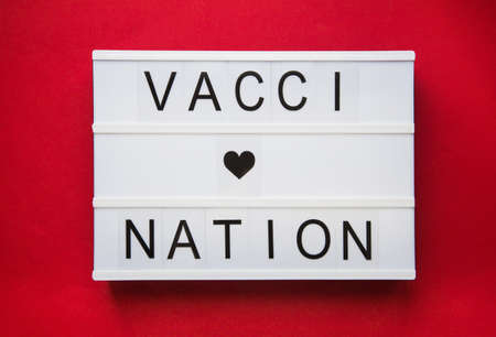 inscription Vaccination on a white plate.の写真素材