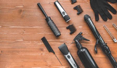 Barber set with tools and equipment on wooden table background. space for text. mock-up, top veiw. Hair salonの写真素材