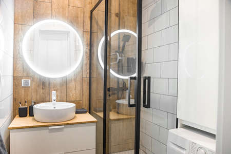 small bathroom with shower and washing machine. Interior Designの写真素材