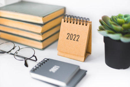 Calendars 2022 on table, close up. New year concept