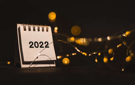 Calendar 2021 on black background with golden bokenの写真素材