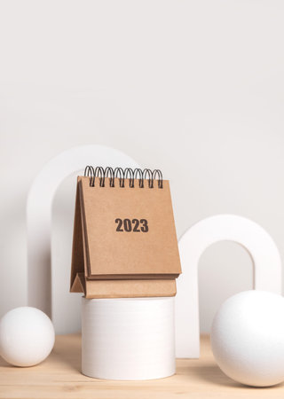 Desktop calendar for 2023 on a beige background. goals and plans on next year.