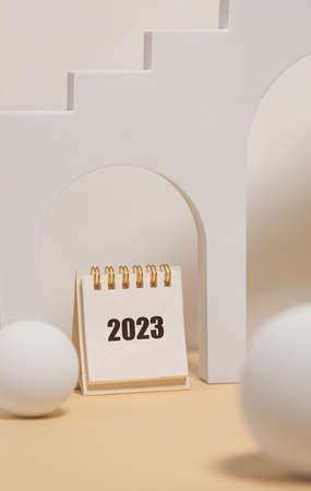 Desktop calendar for 2023 on a beige background. goals and plans on next year.の写真素材