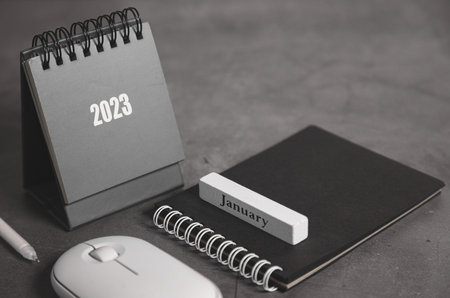 Desktop calendar for 2023 on a beige background. goals and plans on next year.