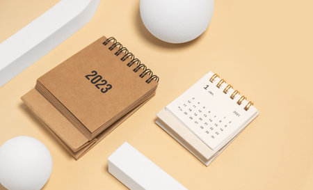 Desktop calendar for 2023 on a beige background. goals and plans on next year.