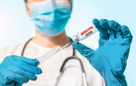 Monkeypox vaccine in doctors hand, Monkey pox virus, treatment, health and injection.の写真素材