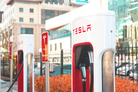 Astana, Kazahstan - October 15, 2022: electric car Tesla charging on supercharging station