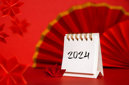 Chinese new year 2024, calendar on red backgroundの写真素材