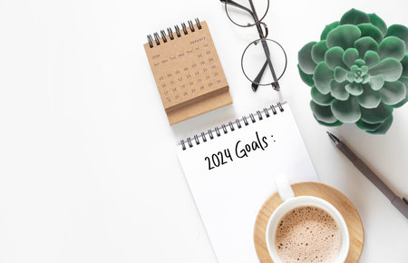 Calendar 2024 and notepad on office table. to-do list and plan for next year. flatlay compositionの写真素材