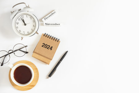 Flat lay composition office table with 2024 calendarの写真素材
