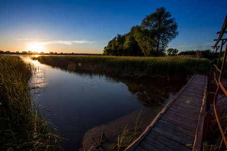 Small bridge over riverの写真素材